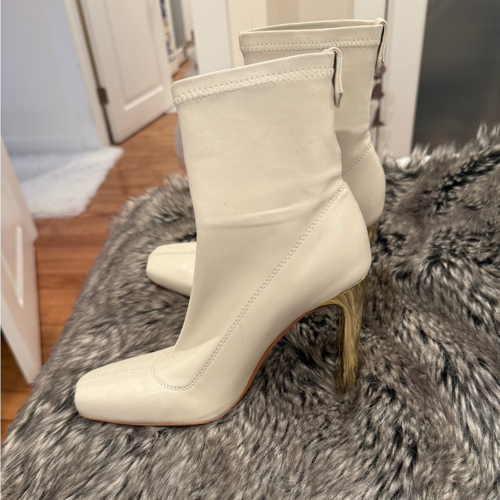Cream boots with gold heels